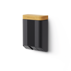 Simpson & Partners Home Plus 7 kW EV charger with dark grey front and light oak lid wall mounted smart home charging unit