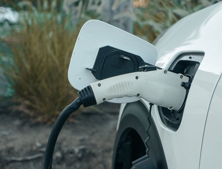 electric vehicle plugged into a charger